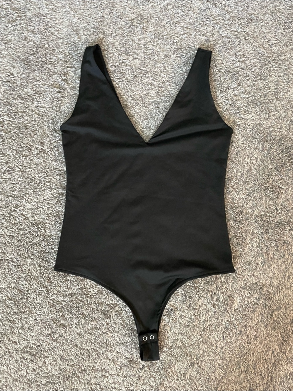 ReoRia Black V-Neck One-Piece Bodysuit